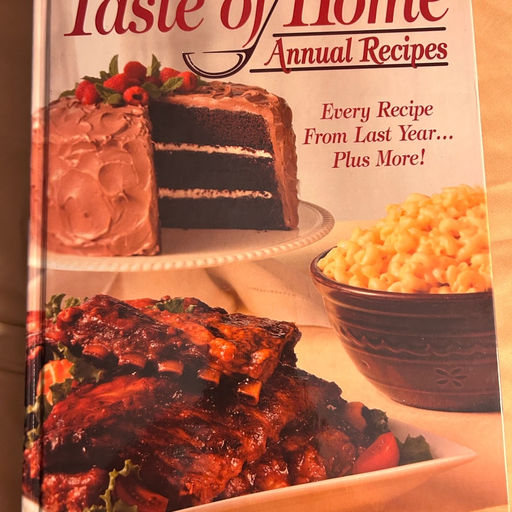 Taste of Home Annual Recipes Cookbook with Rich Brown and Cream Cover